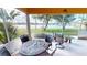 Tranquil screened lanai with views of the lake, perfect for outdoor enjoyment at 26287 Stillwater Cir, Punta Gorda, FL 33955