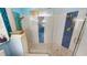 Beautiful, spacious glass shower with attractive tile accents and dual shower heads at 26287 Stillwater Cir, Punta Gorda, FL 33955