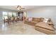 Bright living room with tile flooring, neutral walls, comfortable seating, and natural light, creating a cozy atmosphere at 31093 N Bend St, Punta Gorda, FL 33982