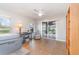 Bright office space has tiled floor, ceiling fan, desk and sliding glass door at 31093 N Bend St, Punta Gorda, FL 33982