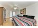 This comfortable bedroom has 2 beds and a door to the outdoor space at 3790 Peace River Dr, Punta Gorda, FL 33983