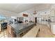Spacious eat-in kitchen offers light wood floors, neutral cabinets and a large dining table at 3790 Peace River Dr, Punta Gorda, FL 33983