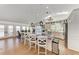 Gourmet kitchen with seating at the island and an adjacent dining area at 3790 Peace River Dr, Punta Gorda, FL 33983
