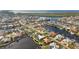 Aerial view of canal front homes showing waterfront neighborhood with boat docks and gulf access at 3820 Turtle Dove Blvd, Punta Gorda, FL 33950