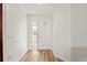 Bright and airy foyer with a view into the front door at 3940 Abbotsford St, North Port, FL 34287