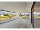 Enclosed patio with screen windows offering relaxing water views at 3940 Abbotsford St, North Port, FL 34287