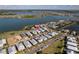 Breathtaking aerial view of a residential area near a stunning lake, highlighting community charm and waterfront access at 42210 Lake Timber Dr, Punta Gorda, FL 33982