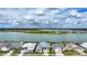 Aerial view of waterfront neighborhood showcasing picturesque homes and a beautiful lake setting at 42239 Lake Timber Dr, Punta Gorda, FL 33982