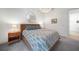 Cozy bedroom with neutral colors and a large bed that is flanked by matching nightstands at 42239 Lake Timber Dr, Punta Gorda, FL 33982