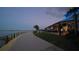 Picturesque lakeside restaurant with a boardwalk and ample outdoor seating in a serene atmosphere at 42239 Lake Timber Dr, Punta Gorda, FL 33982