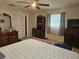 Primary bedroom with neutral walls and carpet flooring offers lots of space at 447 Yeager St, Port Charlotte, FL 33954