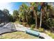 A manicured backyard with a patio and pool with beautiful tropical landscaping at 4529 Enid Ln, North Port, FL 34288