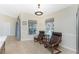 Cozy sitting area with seating and natural light at 4529 Enid Ln, North Port, FL 34288
