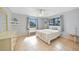 Bright bedroom with tiled floor, two large windows, and neutral decor at 494 Monaco Dr, Punta Gorda, FL 33950