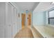 Hallway with access to a soaking tub on the right and 2 showers through doorways ahead at 494 Monaco Dr, Punta Gorda, FL 33950