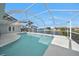 A screened pool offers a relaxing waterfront experience and canal views at 494 Monaco Dr, Punta Gorda, FL 33950