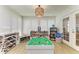 Bright playroom filled with toys, bookshelves, white shiplap walls, and plantation shutters at 621 Trabue Ave, Punta Gorda, FL 33950
