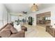 Spacious playroom with natural light, fan, and easy access to other rooms for seamless Gathering living at 621 Trabue Ave, Punta Gorda, FL 33950