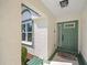 Welcoming front door with a glass accent, complemented by a decorative welcome mat at 726 Connemara Ct, Venice, FL 34292