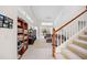 Bright and airy living room with a staircase and an open floor plan at 726 Connemara Ct, Venice, FL 34292