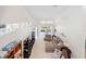Open-concept living room with vaulted ceilings and ample natural light at 726 Connemara Ct, Venice, FL 34292