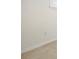 Close up of a room showing neutral walls, baseboard and carpet at 726 Connemara Ct, Venice, FL 34292
