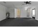 Finished basement area with new carpet, water heater, and bathroom access at 20343 Rutherford Ave, Port Charlotte, FL 33952