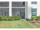 Lush backyard with a screened-in patio and manicured lawn at 15970 Grassland Ln # 2816, Punta Gorda, FL 33982