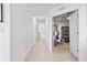 Hallway entrance to office space with art and furniture at 15970 Grassland Ln # 2816, Punta Gorda, FL 33982