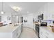 Bright, modern kitchen features stainless steel appliances and a large island at 15970 Grassland Ln # 2816, Punta Gorda, FL 33982