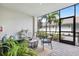 Relaxing screened-in lanai with comfortable seating and peaceful backyard views at 15970 Grassland Ln # 2816, Punta Gorda, FL 33982