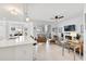 Open floor plan with a view of the living room, dining room, and kitchen at 15970 Grassland Ln # 2816, Punta Gorda, FL 33982