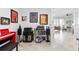 A living room featuring music memorabilia and a view into the main living space at 15970 Grassland Ln # 2816, Punta Gorda, FL 33982