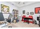 Bright home office with desk, seating, and musical instruments at 15970 Grassland Ln # 2816, Punta Gorda, FL 33982