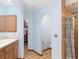 Bathroom with a tiled shower, toilet, and vanity at 1701 Overbrook Rd, Englewood, FL 34223