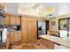 Spacious kitchen features custom cabinets, stainless steel appliances, and ample counter space at 1701 Overbrook Rd, Englewood, FL 34223