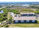 Wide aerial view of the condo complex showing the surrounding community at 175 Kings Hwy # 232, Punta Gorda, FL 33983