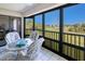Relaxing screened lanai with comfortable seating and scenic views at 175 Kings Hwy # 232, Punta Gorda, FL 33983