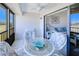 Screened in lanai with views of the greenery and access to the main living spaces at 175 Kings Hwy # 232, Punta Gorda, FL 33983