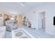 Open-concept living area seamlessly connects living room, dining space, and kitchen at 175 Kings Hwy # 232, Punta Gorda, FL 33983