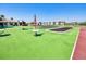 Community recreation area with tables and umbrellas to enjoy playing shuffleboard at 175 Kings Hwy # 232, Punta Gorda, FL 33983