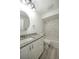 Well-lit bathroom featuring a granite vanity, white cabinets, and a shower-tub combination at 21229 Giddings Ave, Port Charlotte, FL 33952