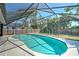 Relaxing pool with a screened enclosure and plenty of sunshine at 21229 Giddings Ave, Port Charlotte, FL 33952