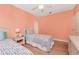 This bedroom featuring two beds, light walls, and a ceiling fan at 2181 Via Seville, Punta Gorda, FL 33950