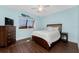 Comfortable bedroom featuring a ceiling fan and a dresser at 2181 Via Seville, Punta Gorda, FL 33950