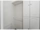 Functional closet with shelves and cabinets for organized storage in a home at 2181 Via Seville, Punta Gorda, FL 33950