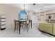 Dining area with a window view, chandelier, table with seating, and tile flooring at 2181 Via Seville, Punta Gorda, FL 33950