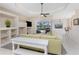 Bright living room with a comfortable sofa, view to the backyard pool and ample space for entertaining at 2181 Via Seville, Punta Gorda, FL 33950