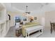 Inviting living room featuring an open floor plan, backyard views, and stylish furniture at 2181 Via Seville, Punta Gorda, FL 33950
