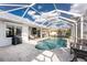 Private screened-in pool and patio area, perfect for outdoor entertainment and relaxation near the canal at 2181 Via Seville, Punta Gorda, FL 33950